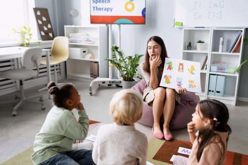 young-woman-doing-speech-therapy-with-kids-1